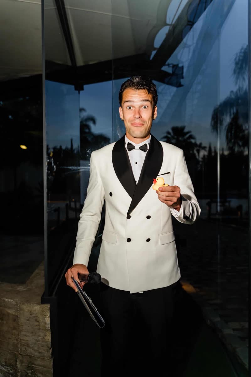 Vova holding the rubber duck a guest gave him during the wedding